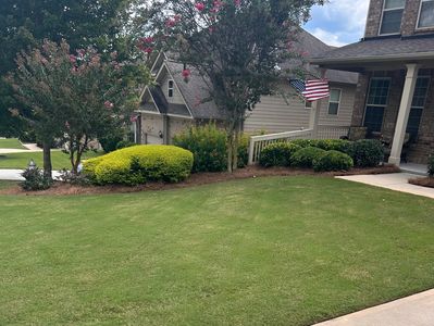 Manicured lawn in Dacula, Ga. Work done by Signature Lawn Service