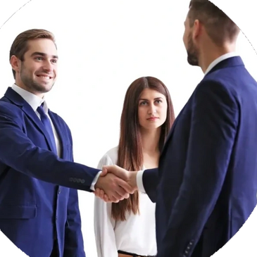 two people shaking hands with other person in middle behind