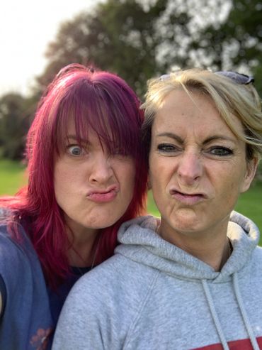 Two ladies (the Makers at In Stitches) pulling funny faces into the camera