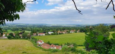 A view of Chew Valley lake and houses in the valley at countryside HQ