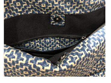 The inside pocket of a handbag