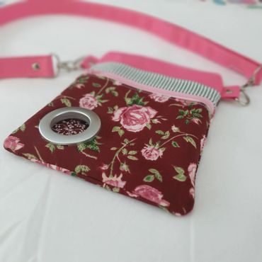 Close up of a dog walking cross-body bag