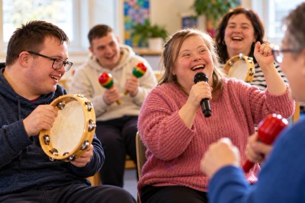 Group enjoying music and singing together.