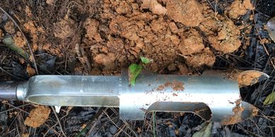 Soil and auger bucket