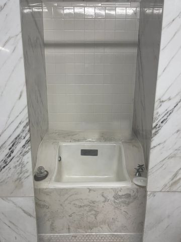 Buckstaff Bathhouse sitz tub surrounded by Colorado marble in Hot Springs, Arkansas