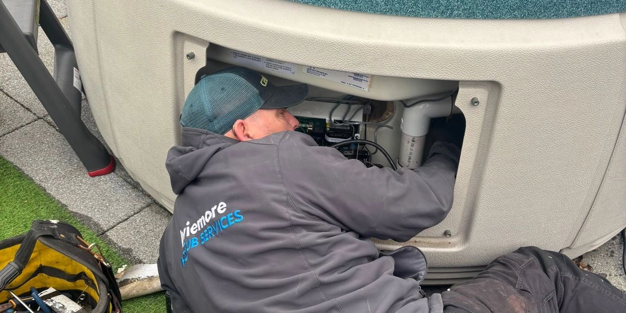 Aviemore Hot Tub Services Technician repairing a fault