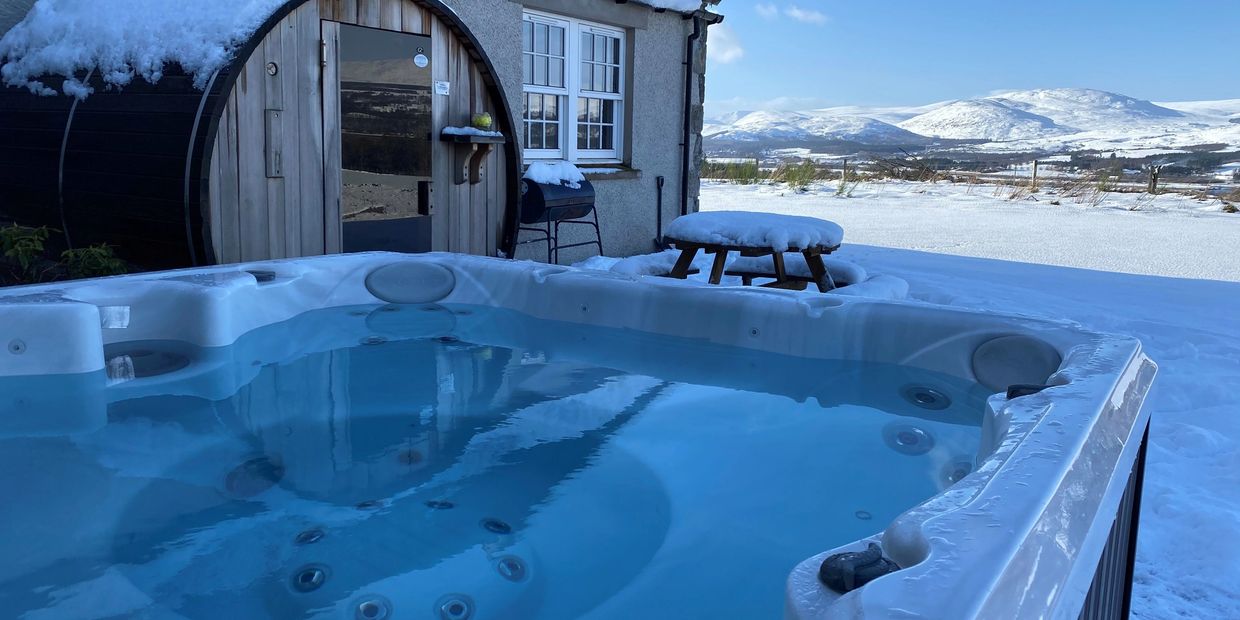 Hot tub in the snow in the Scottish Highlands