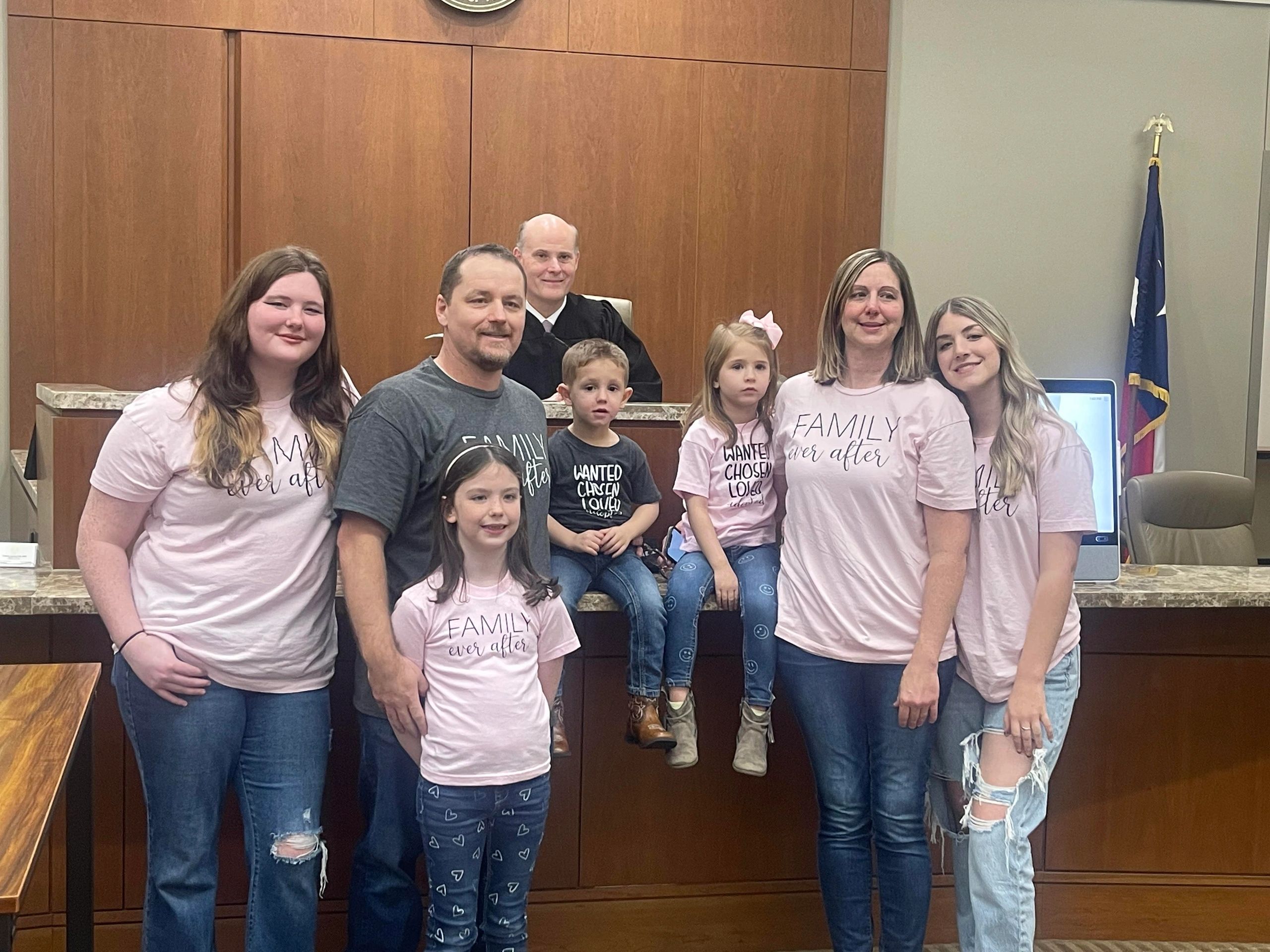 A family celebrating an adoption milestone together