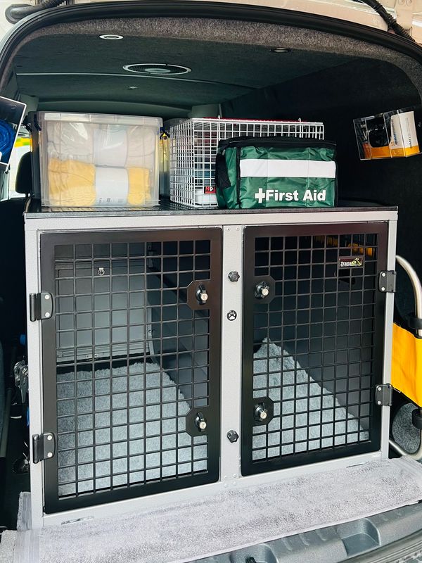 THE BIG PAWS LITTLE PAWS CO ANIMAL AMBULANCE VAN INSIDE BACK
TRANS K9 CRATE
VET BEDDING
FIRST AID 