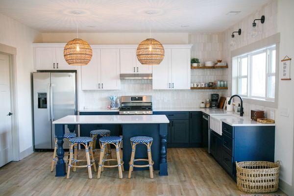 Kitchen with Blue and White Cabinets and Quartz Countertops. Remodel and Renovations and New Builds.