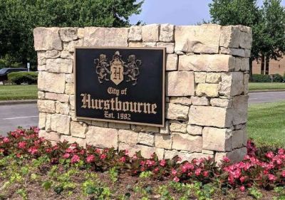 Stone monument for City of Hurstbourne, established 1982.