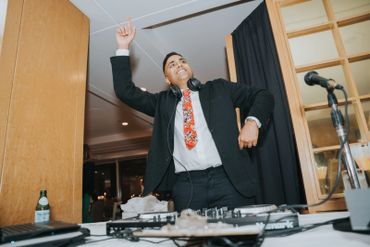 vancouver dj dancing while performing music for guests