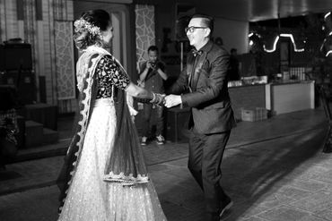 happy wedding couple dancing together