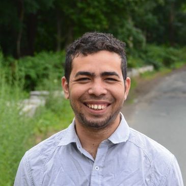 Portrait of a male smiling.