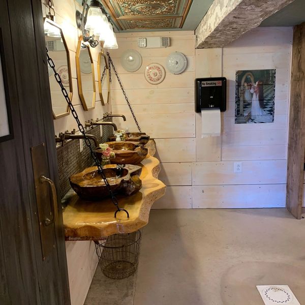 Exquisite Rustic themed Woman's Restrooms