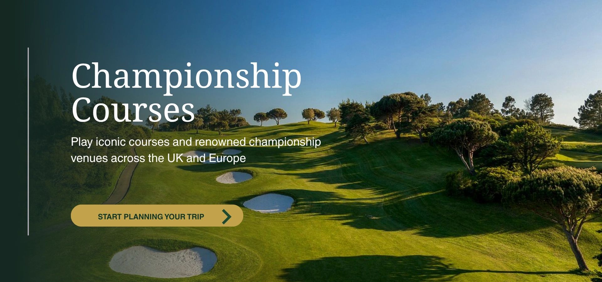 Beautiful golf course with sand bunkers and lush greenery under a clear blue sky.
