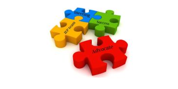 Colorful puzzle pieces labeled with teamwork, meeting, success, and advocate.