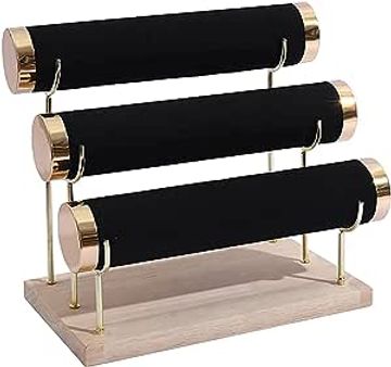 Three-tier black and gold bracelet display stand.