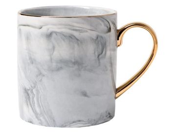 Marble-patterned mug with a golden handle.