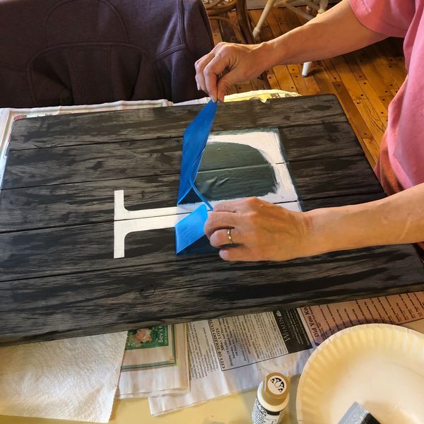 Removing the stencil after painting