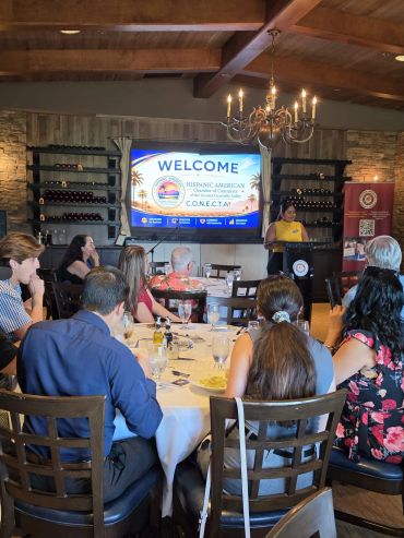 Group attends a Hispanic American Chamber networking event.