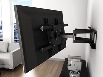 Tv mounted in a living room by a professional. 