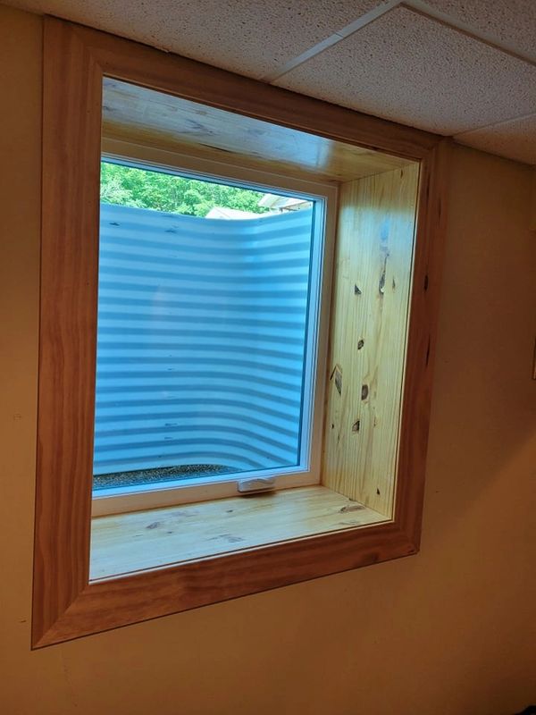 A window with a wooden frame