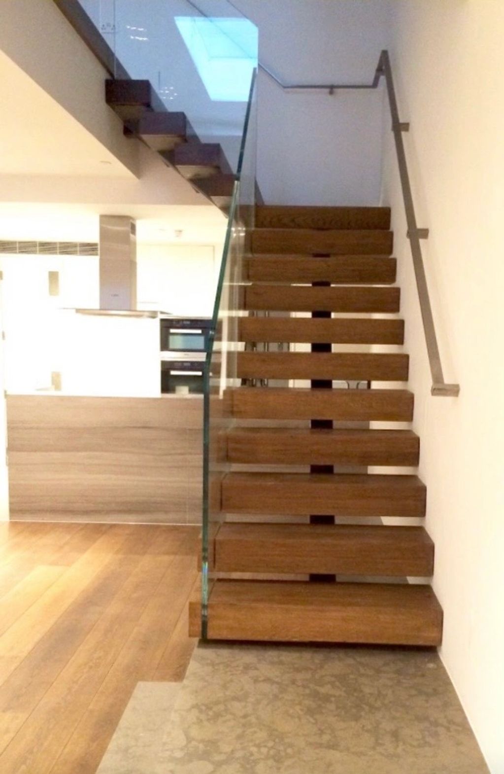 Walnut Single Spine Staircase with Open Treads