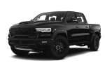 Black pickup truck with rugged design and aggressive front grille.