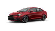Red modern sedan with sleek design and black wheels.