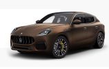 A sleek brown luxury SUV with modern design features.
