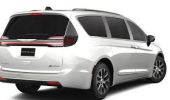 Rear view of a modern white SUV with sleek design.