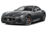 Sleek black Maserati sports car with red brake calipers.