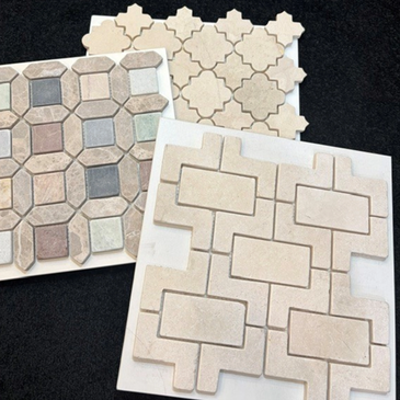 Three different stone tile mosaics on black background.