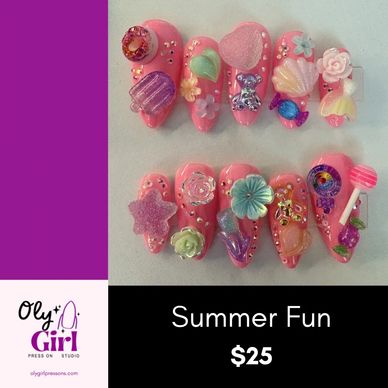 Colorful summer-themed press-on nails with 3D decorations.