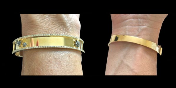 18carat yellow gold nameplate bangle with starburst accents with .7carats diamonds $7400