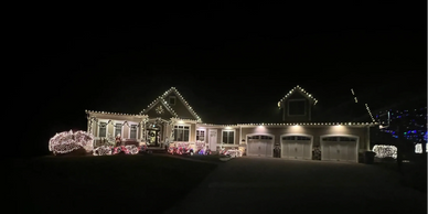 Completed holiday lights display by TAP Roofing and Siding LLC