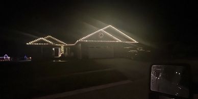 Completed holiday lights display by TAP Roofing and Siding LLC