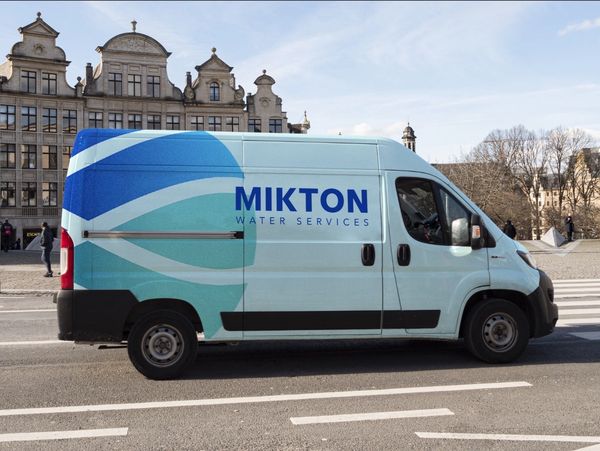 White van with the Mikton logo on it