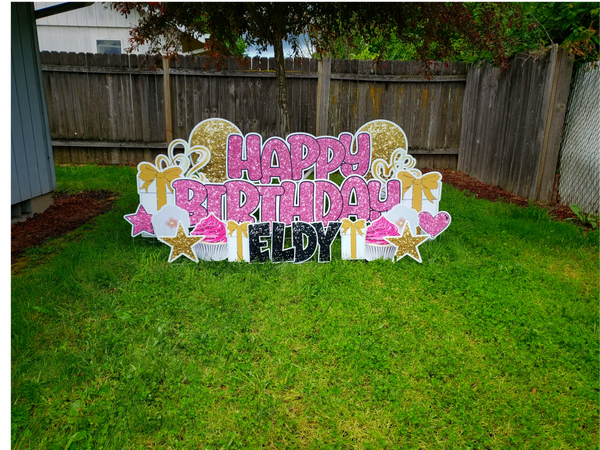 Birthday yard signs, cupcakes, balloons, presents and flowers in pink and gold. 
