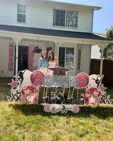 graduation yard sign in yard, custom graduation signs, yard sign rentals