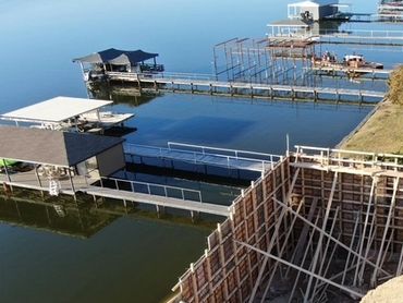 Top view of of retainer wall between house and lake.