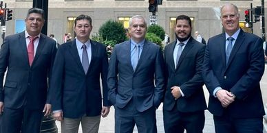 group of business executives in front of the Chicago board of trade.e