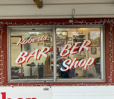 Classic barber shop window sign.