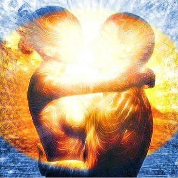 Two radiant figures embracing with a glowing light between them.