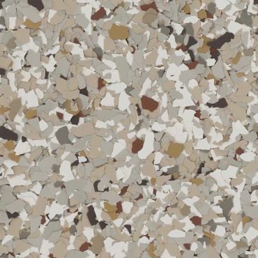 Close-up of a textured surface with beige, brown, and white flakes.