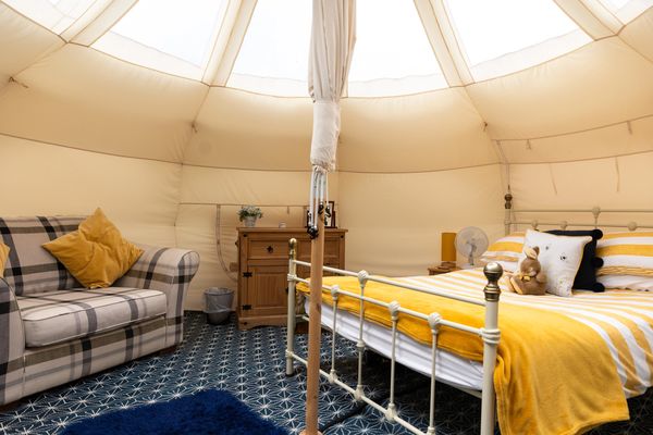 Interior of our Stargazing belle tent with the roof open to let the light in.