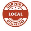 Badge encouraging support for local businesses.