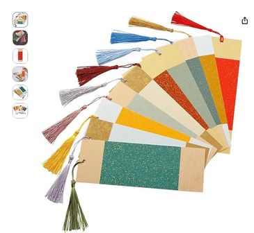 Set of colorful bookmarks with tassels in various shades.