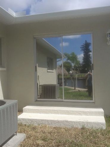 This is how solar silver20 mirror tint looks from the outside of the sliding glass doors 